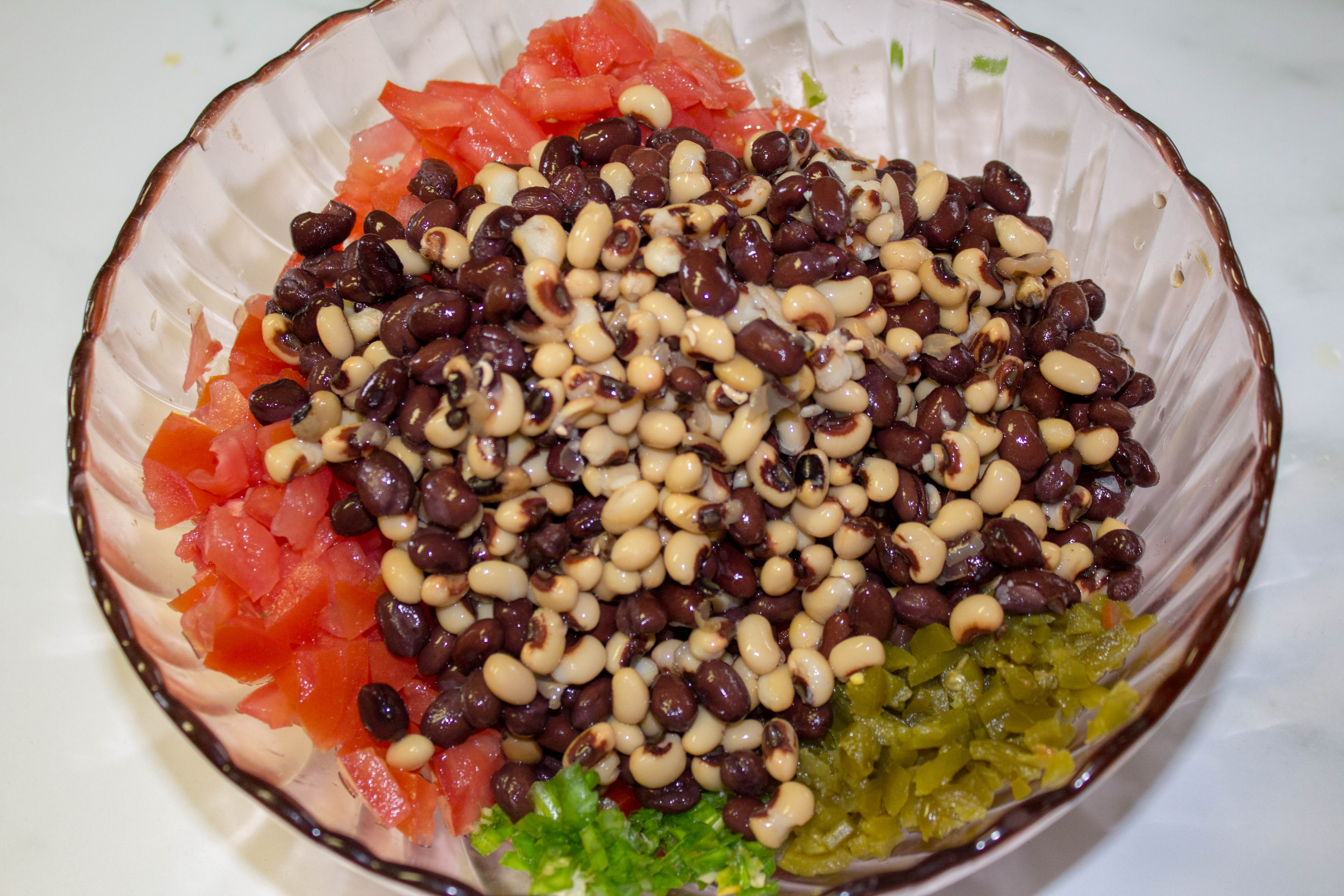 Cowboy Caviar is a flavor-packed side dish that also happens to be healthy. It makes a great salsa, dip, or salad at any picnic or get together! Naturally vegan and gluten-free.