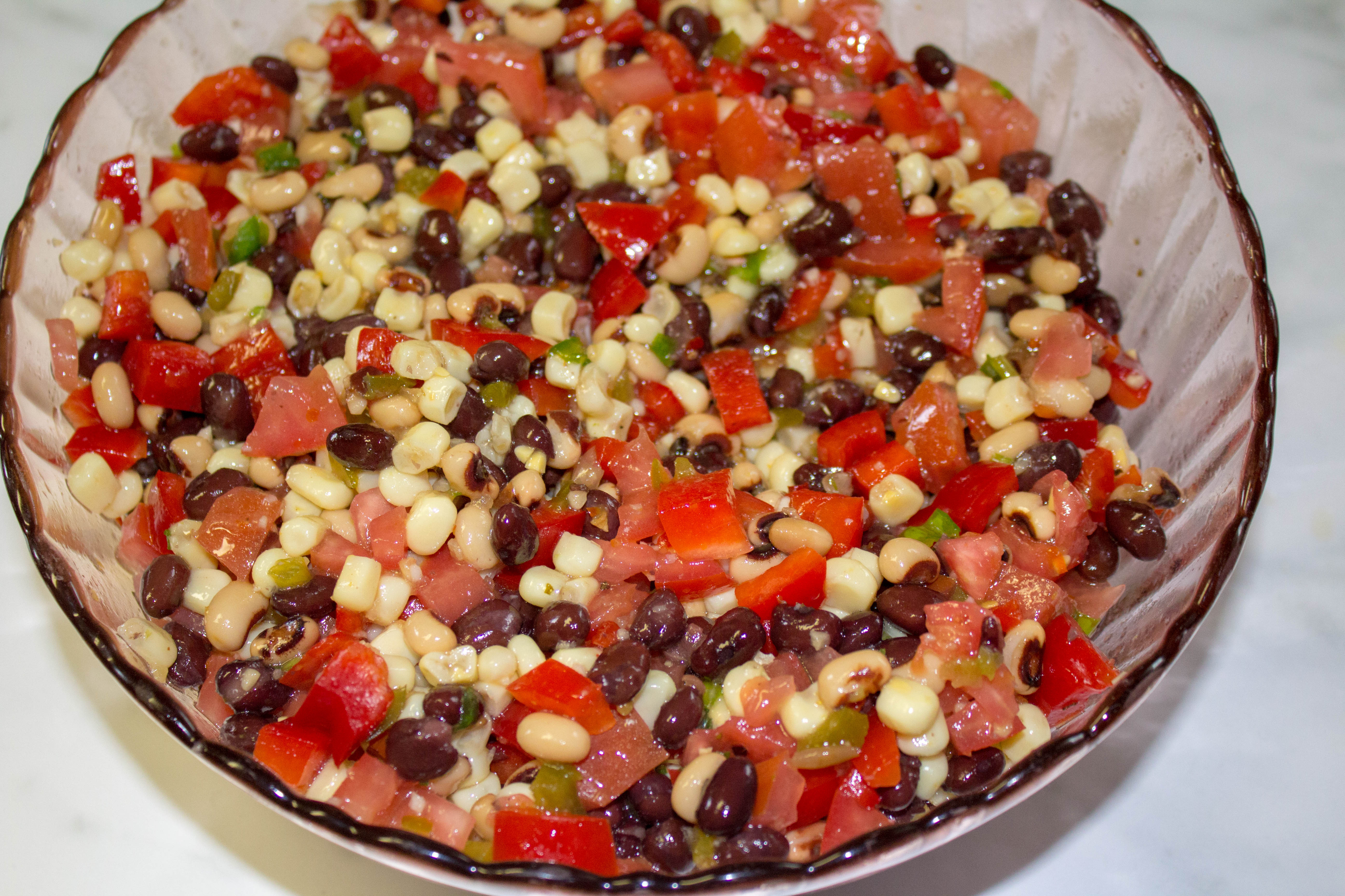 Cowboy Caviar is a flavor-packed side dish that also happens to be healthy. It makes a great salsa, dip, or salad at any picnic or get together! Naturally vegan and gluten-free.