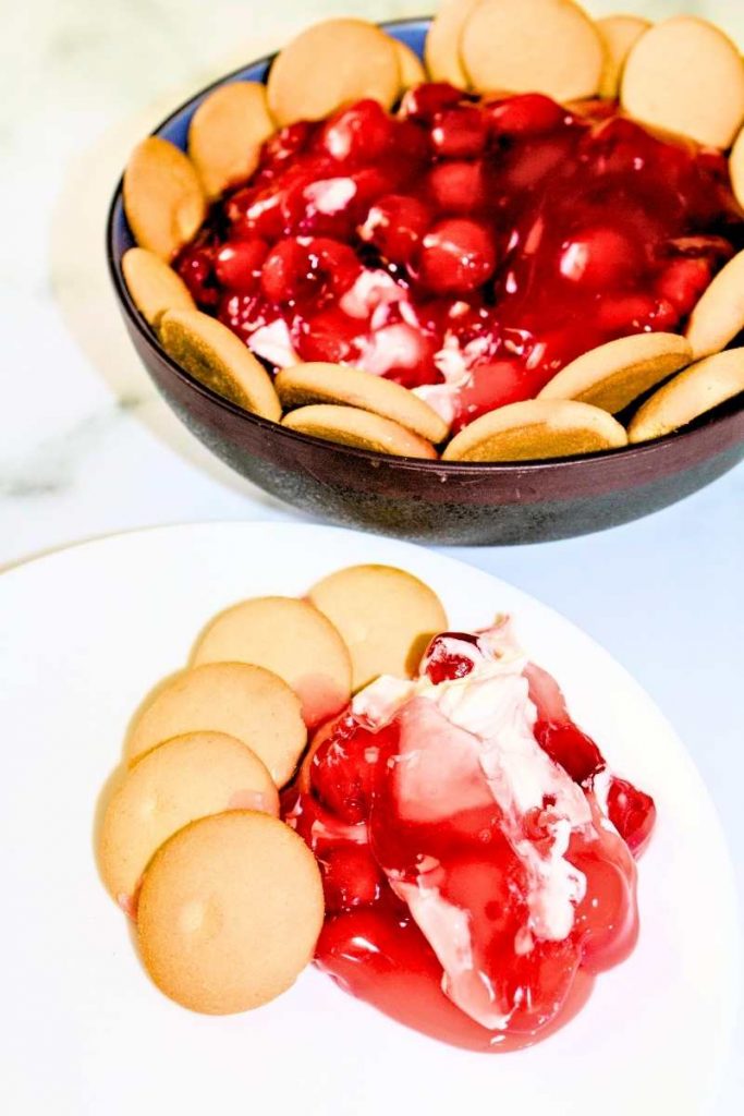 Cherry Cheesecake dip on a white plate.