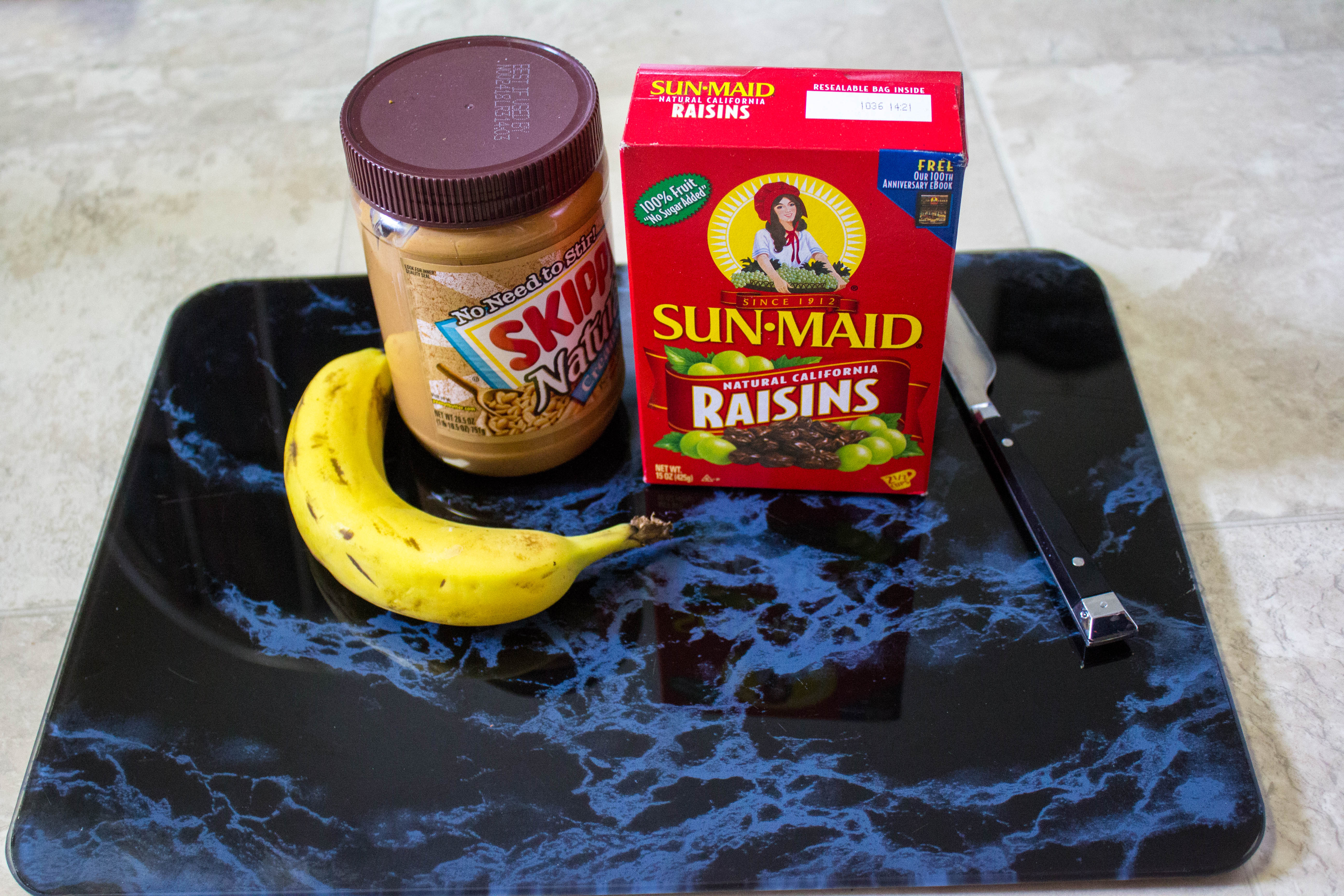 Looking for a healthy snack for kids? This simple to make delicious peanut butter raisin bananas will be a treat kids ask for. 