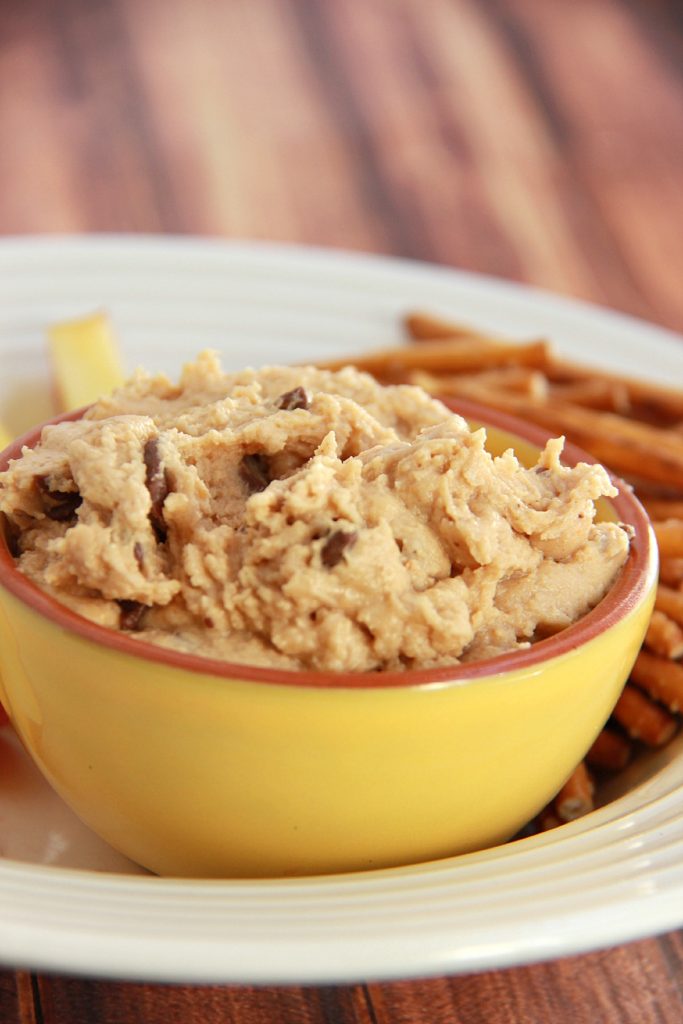Cookie dough dip in a yellow bowl.
 
