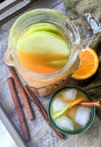 Looking for a simple punch recipe? This healthy punch recipe brings in all the flavors of apples, oranges and ginger together with only healthy ingredients.