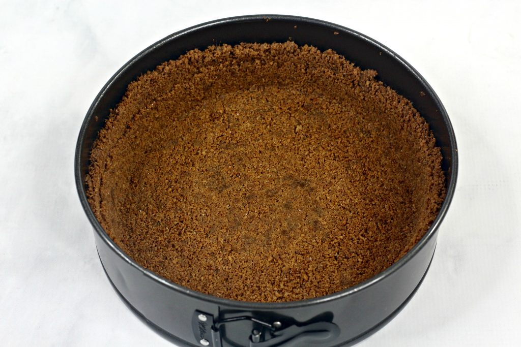 gingersnap cookie crust in a pan
