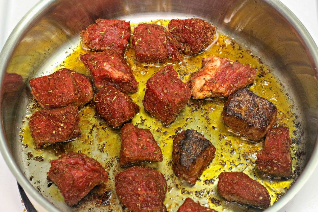 Steak bites in a frying pan