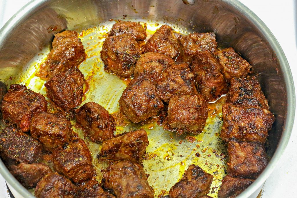 steak in a frying pan