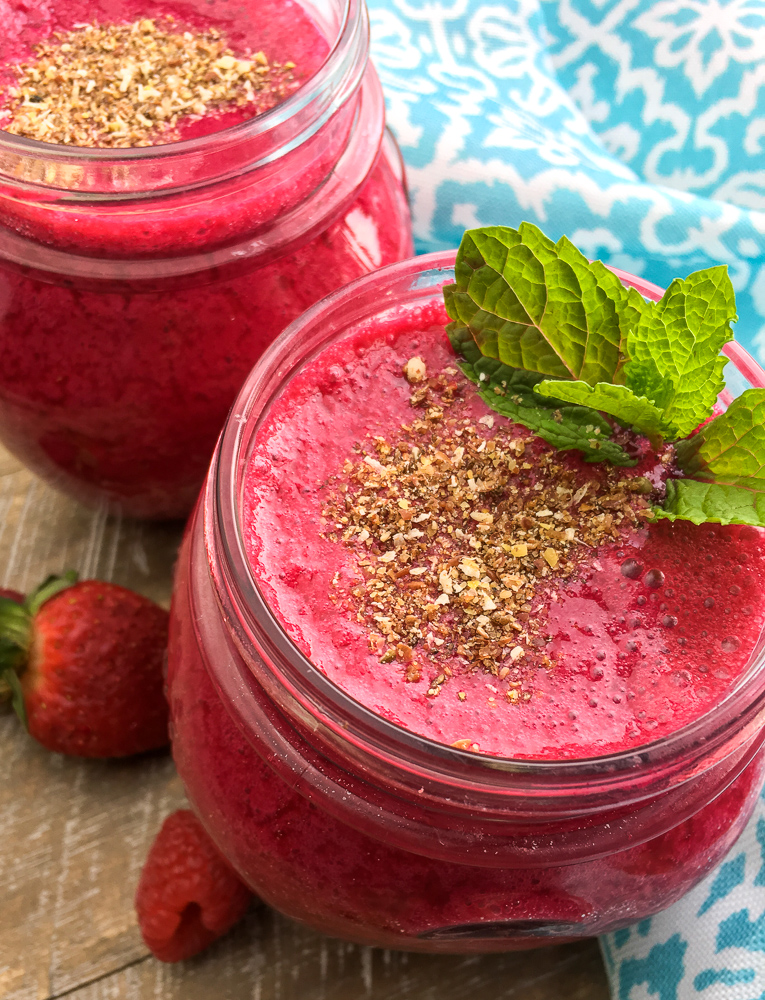 Berries smoothie topped with chia seeds.