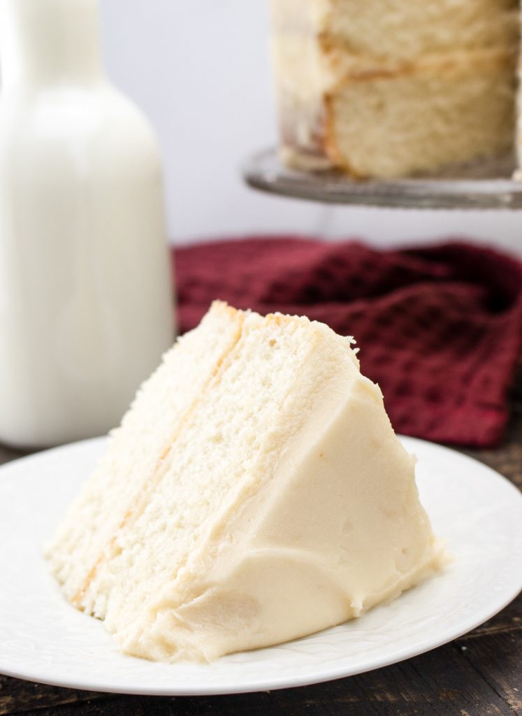 American Buttercream Frosting cake on a white plate.