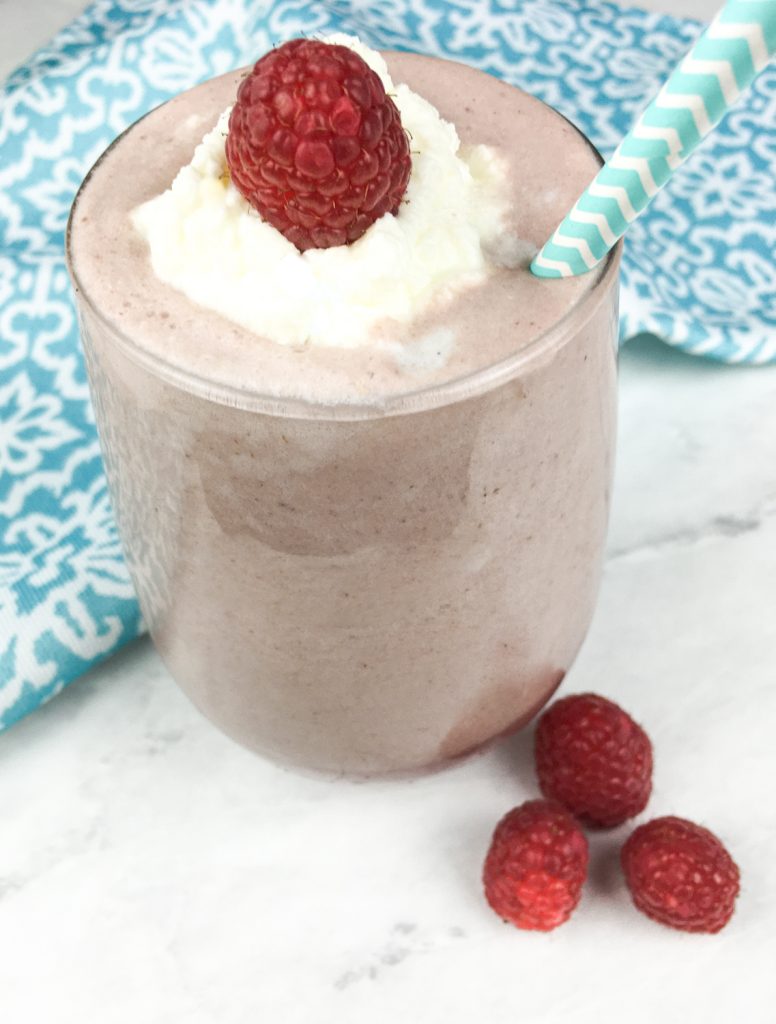 Raspberry Creamsicle Smoothie in a glass.