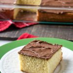 Classic Yellow Cake topped with chocolate frosting.