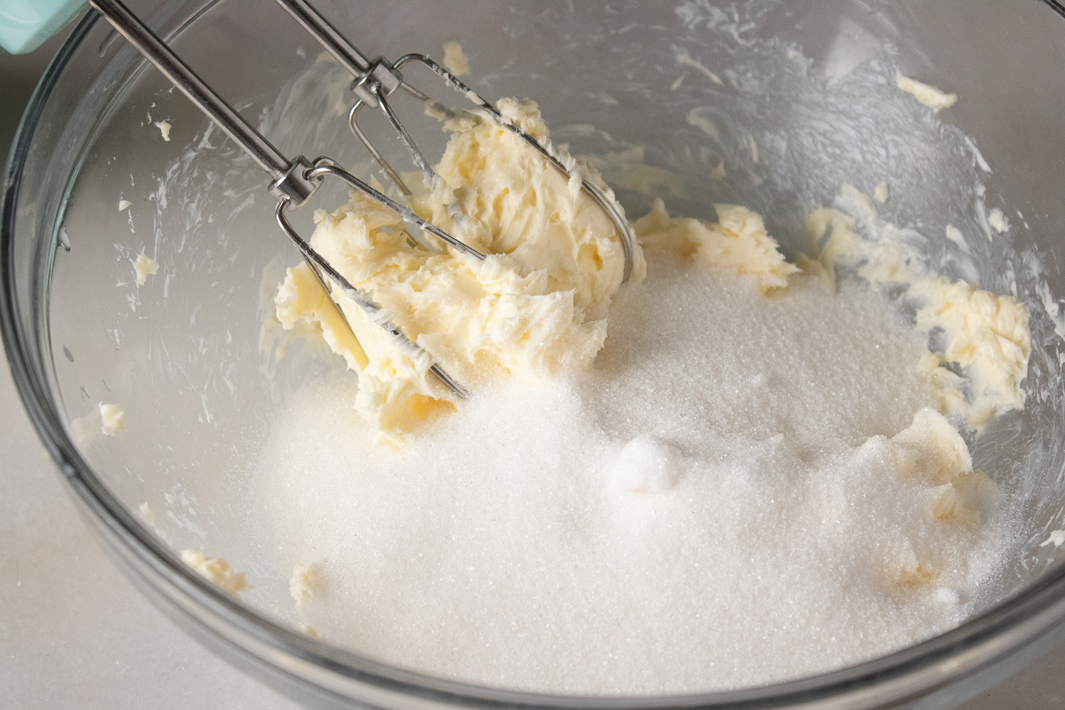Combining the butter and sugar.