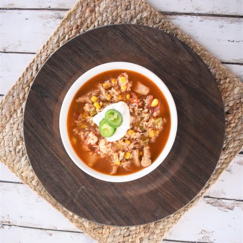 Slow Cooker Southwest Chicken Rice Soup in a white bowl.