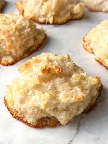 Coconut Macaroons on a marble countertop.