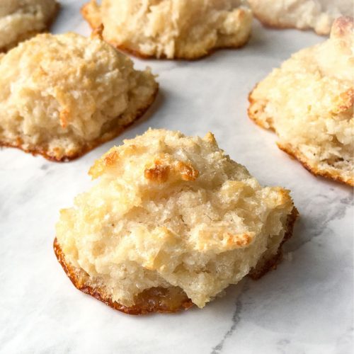 Coconut Macaroons on a marble countertop.
