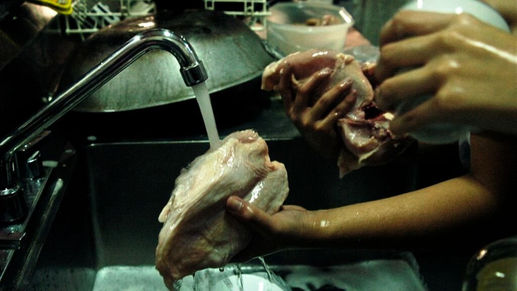 Why You Should Stop Washing Your Chicken, According to Food Safety Experts